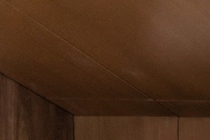 Modern chairs and built-in seating in West Philadelphia apartment building lobby